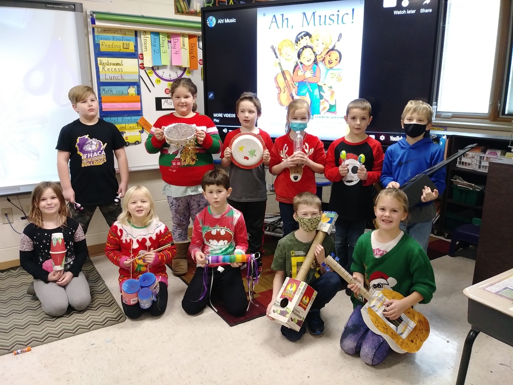 2nd Graders with recycled material instruments after reading Ah, Music!